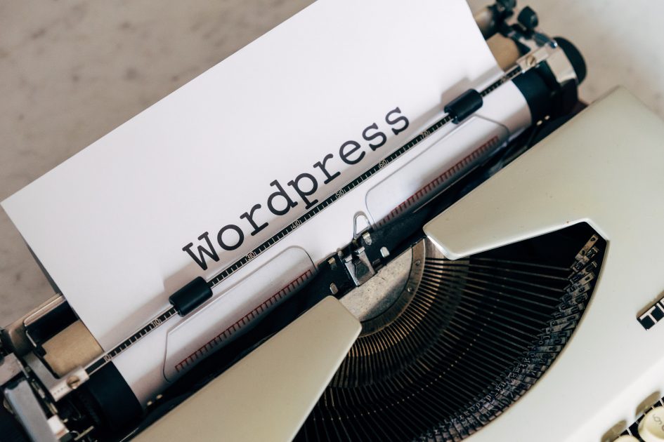 typewriter with the word "wordpress"
