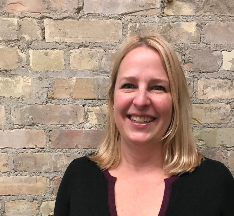 Picture of Joanne Kehoe on a brick wall background