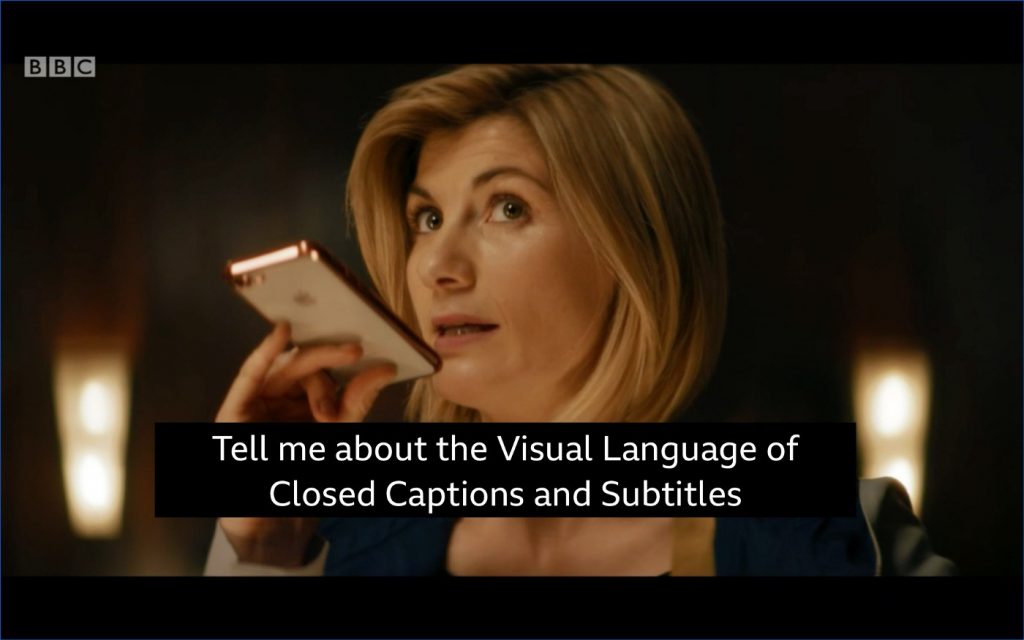 Woman talking into phone with captions that read: Tell me about the visual language of closed captions and subtitles.