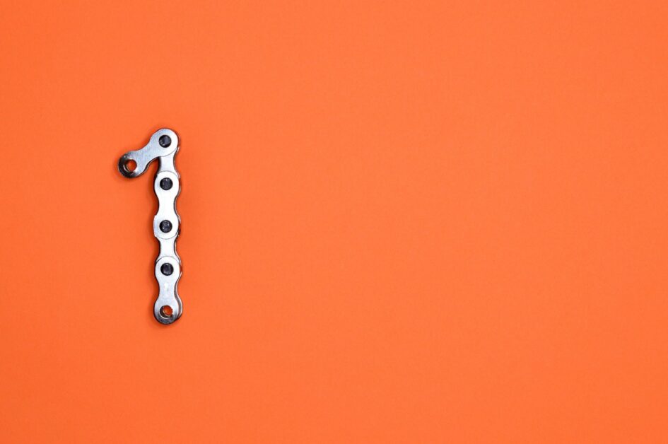 The shape of a one on an orange background.