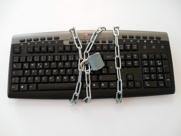 chains wrapped around a keyboard